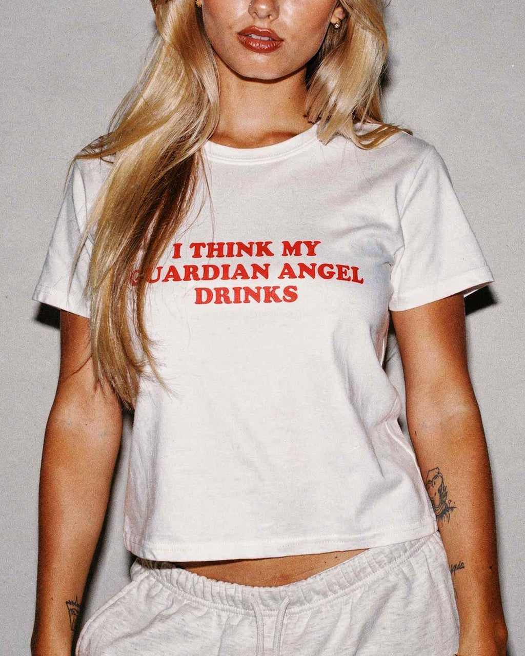 I Think My Guardian Angel Drinks Baby Tee